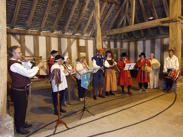 Massed performance by tutors and workshop participants at Cressingham Temple Barns